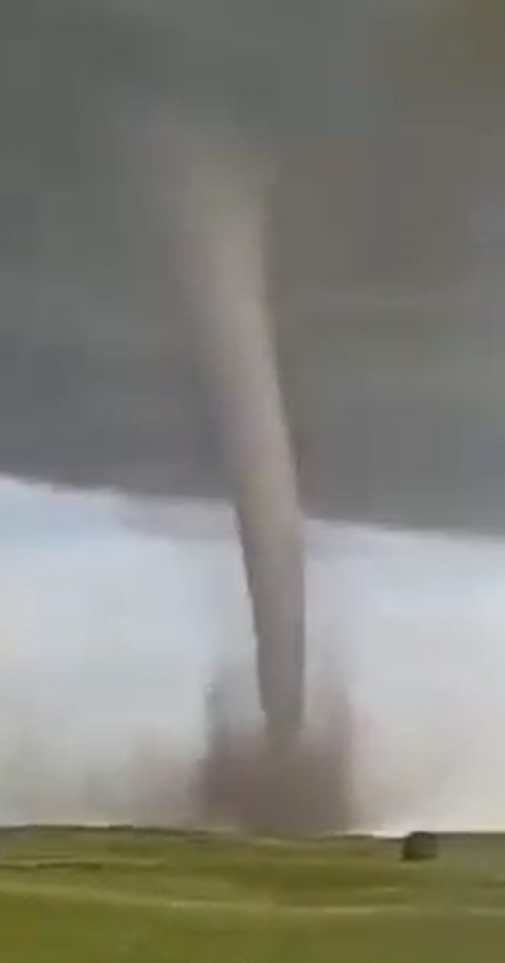 A large tornado is touching the cloud.  The vapor cloud and the
debris cloud are both visible.
