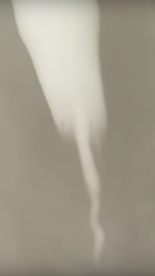 Two nested tornado vapor funnels.
